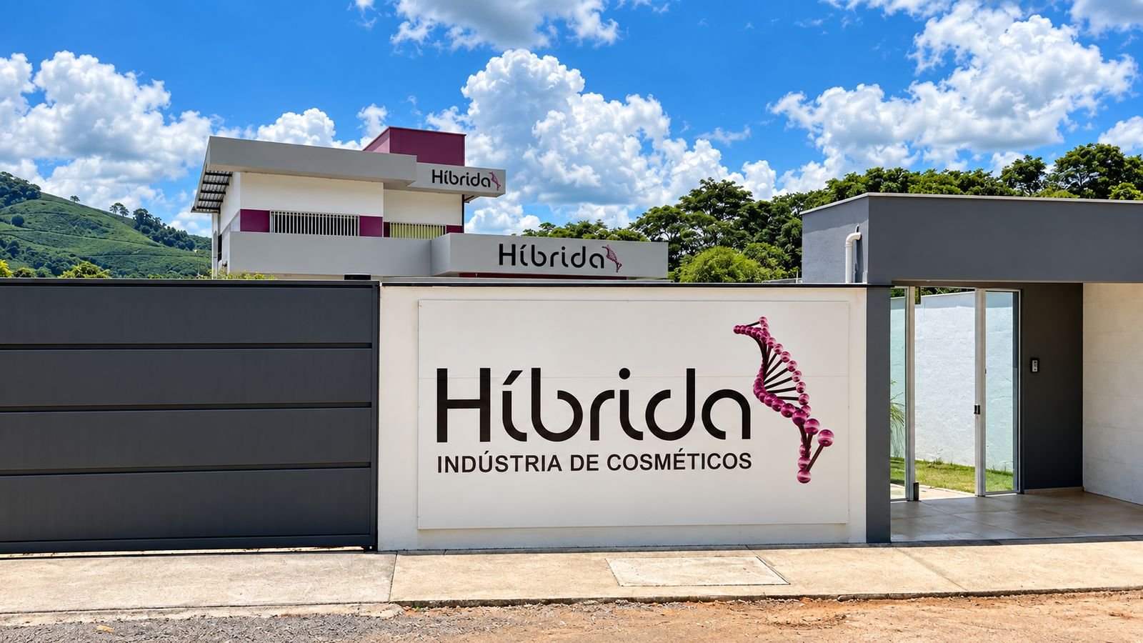 Fachada da indústria Híbrida, com o letreiro da marca e as montanhas ao fundo